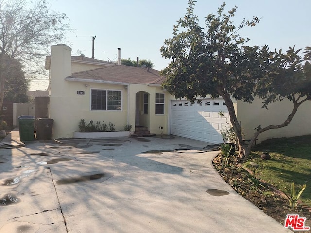 view of front of home with a garage