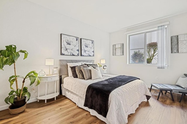 bedroom featuring light wood-type flooring