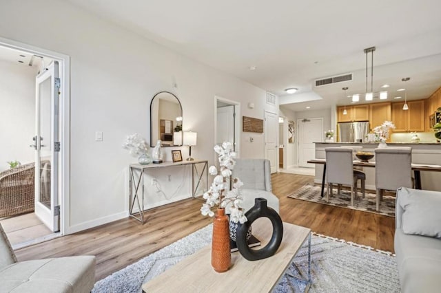 living room featuring light hardwood / wood-style flooring