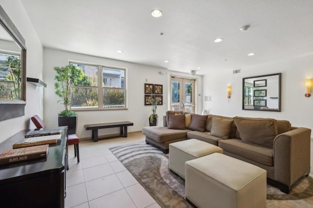 living room with light tile patterned floors