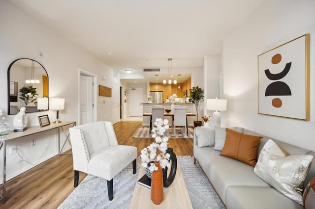 living room with light hardwood / wood-style floors