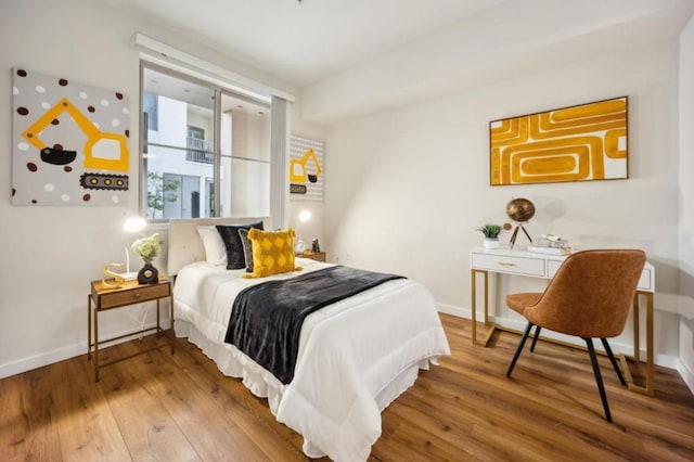 bedroom featuring hardwood / wood-style floors