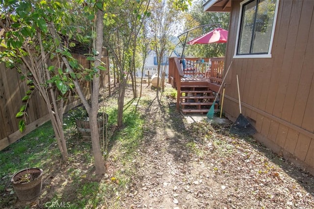 view of yard featuring a deck