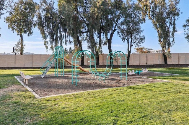 view of play area featuring a lawn