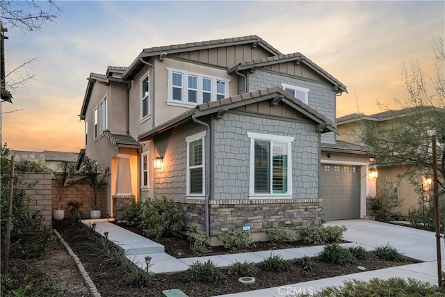 view of front of property with a garage