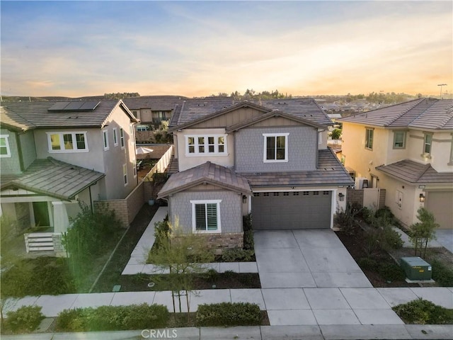 view of front of home with a garage