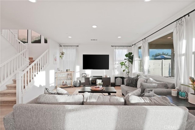 living room featuring radiator and wood-type flooring