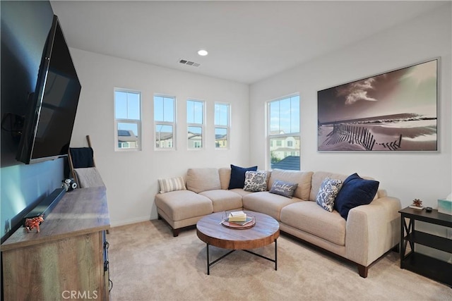 living room featuring light colored carpet