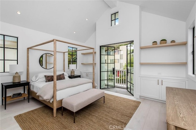 bedroom with light hardwood / wood-style floors, high vaulted ceiling, access to outside, and beamed ceiling