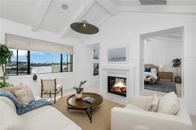 living room featuring lofted ceiling with beams