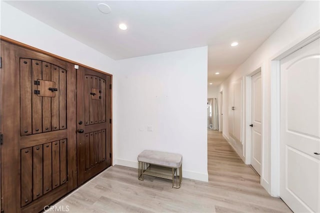 entrance foyer featuring light hardwood / wood-style floors