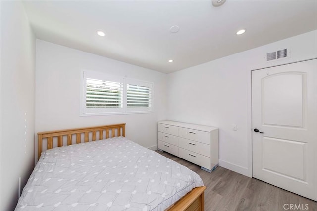 bedroom featuring light hardwood / wood-style floors