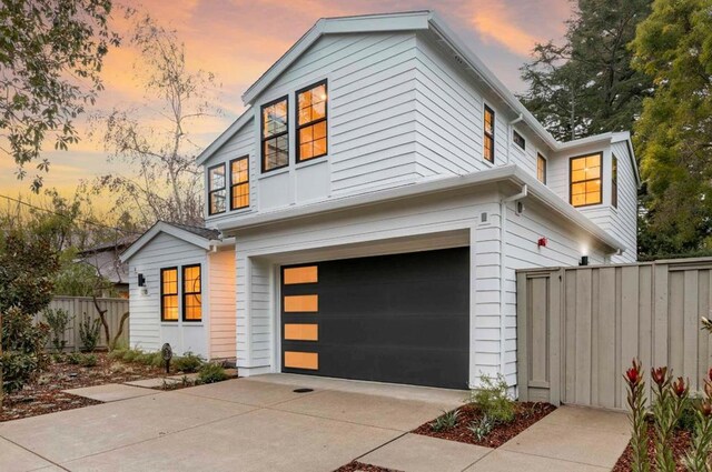 view of front of property with a garage