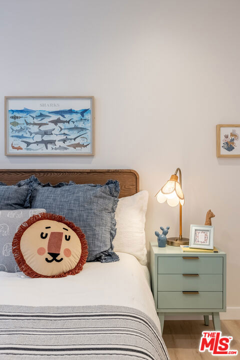 bedroom featuring wood-type flooring