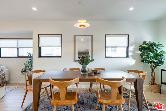 dining space featuring light hardwood / wood-style floors