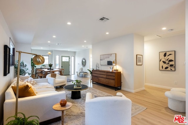 living room featuring light wood-type flooring