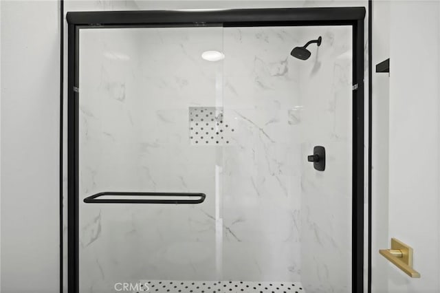 bathroom featuring an enclosed shower