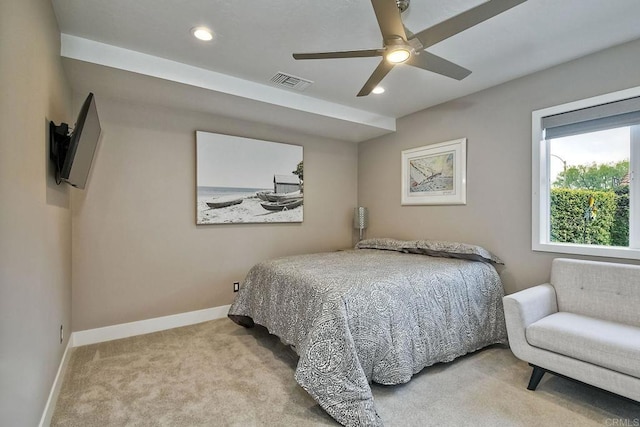 carpeted bedroom featuring ceiling fan