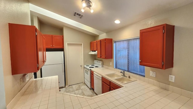 kitchen featuring tile countertops, sink, and white appliances