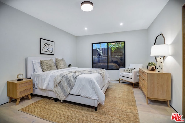 bedroom featuring light hardwood / wood-style flooring