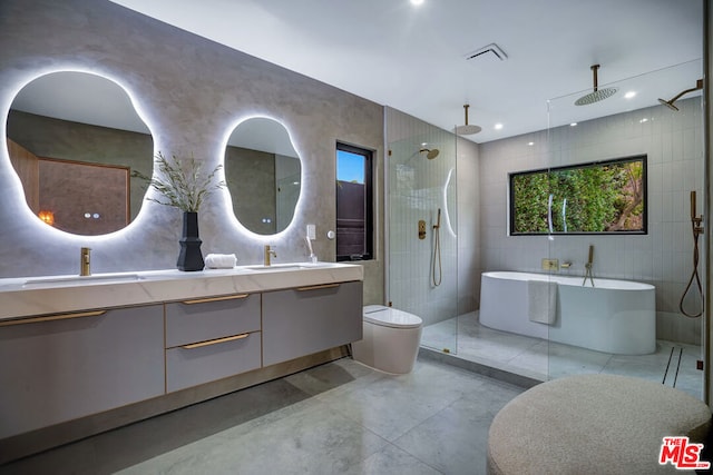 full bathroom featuring plus walk in shower, toilet, tile walls, and vanity