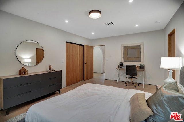 bedroom featuring light wood-type flooring