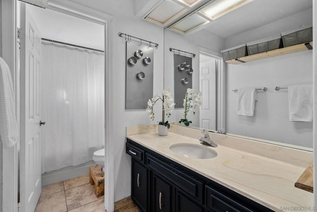 full bathroom featuring vanity, tile patterned flooring, shower / bath combo, and toilet