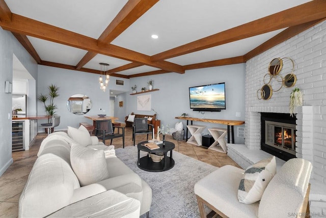 tiled living room with beamed ceiling, a fireplace, coffered ceiling, and wine cooler