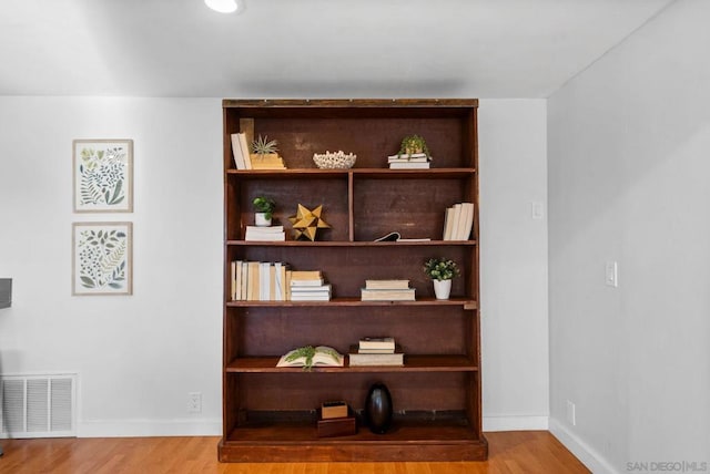 interior details with hardwood / wood-style flooring