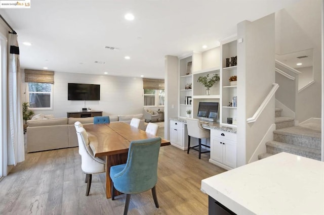 dining room with light hardwood / wood-style floors