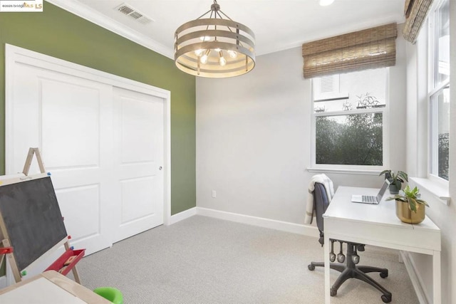 carpeted office space with a notable chandelier and ornamental molding