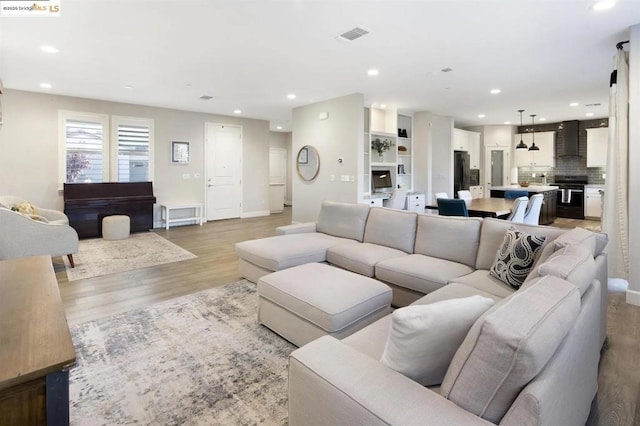 living room with light wood-type flooring