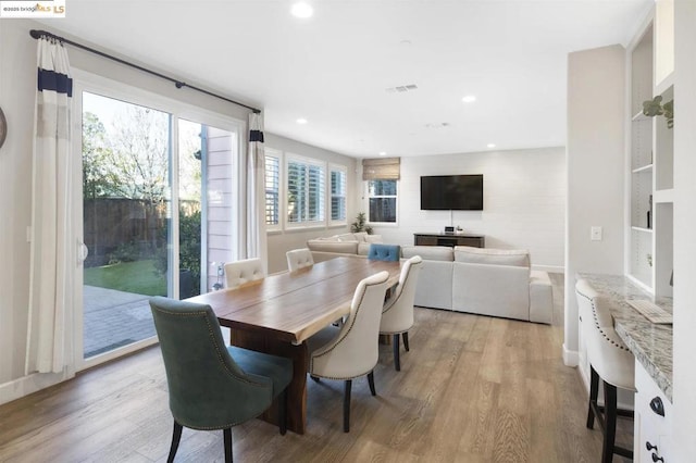 dining room featuring light hardwood / wood-style flooring