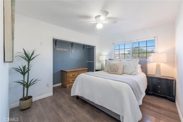 bedroom with dark wood-type flooring and ceiling fan