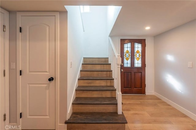 entrance foyer with light hardwood / wood-style floors