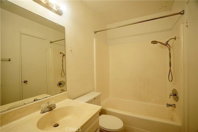 full bathroom featuring toilet, vanity, and shower / bathtub combination