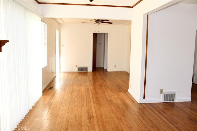 unfurnished room featuring ceiling fan and light hardwood / wood-style floors