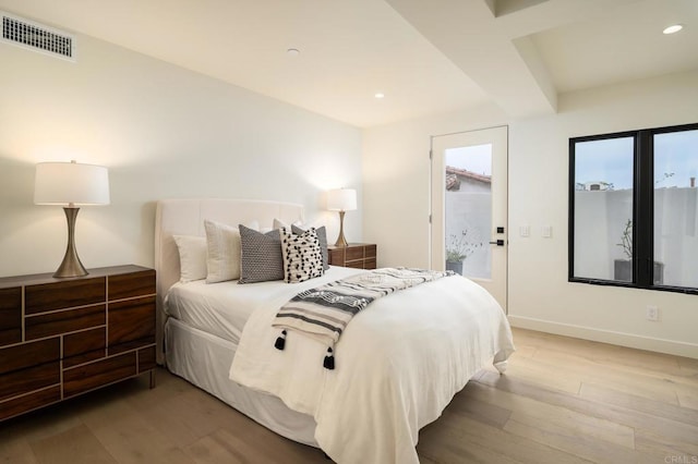 bedroom featuring wood-type flooring