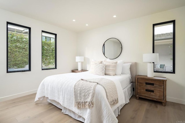 bedroom featuring light wood-type flooring