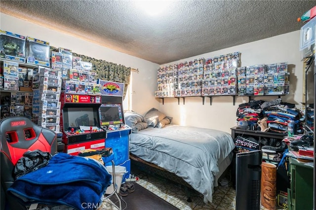 bedroom featuring a textured ceiling