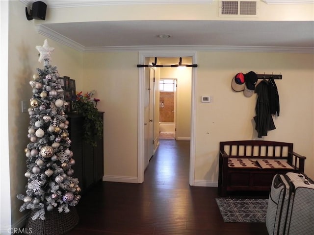 hallway featuring crown molding and dark wood-type flooring