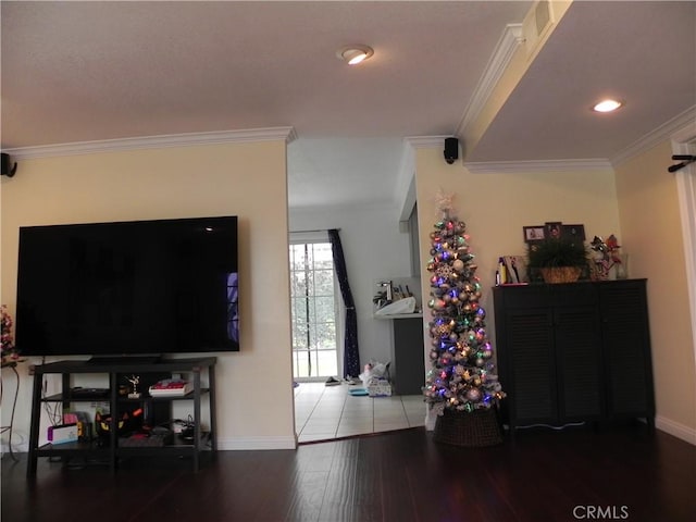 interior space featuring hardwood / wood-style flooring and crown molding