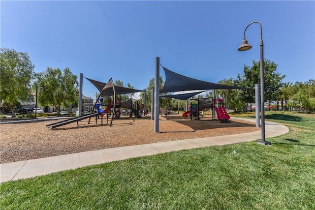 view of playground featuring a lawn