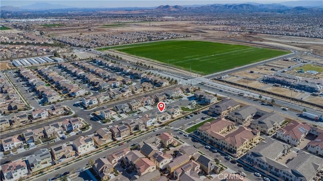 birds eye view of property featuring a mountain view