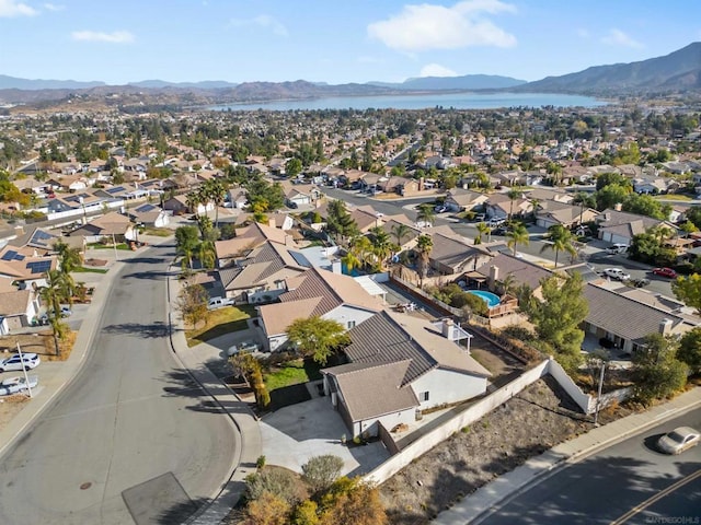 birds eye view of property with a mountain view