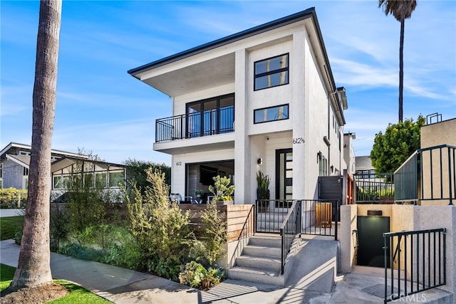 contemporary house with a balcony