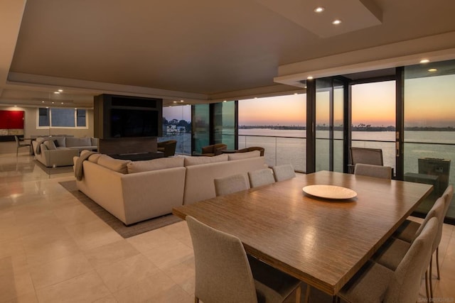 dining room featuring floor to ceiling windows