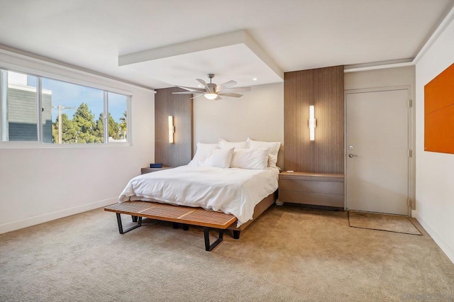 bedroom featuring ceiling fan and light colored carpet