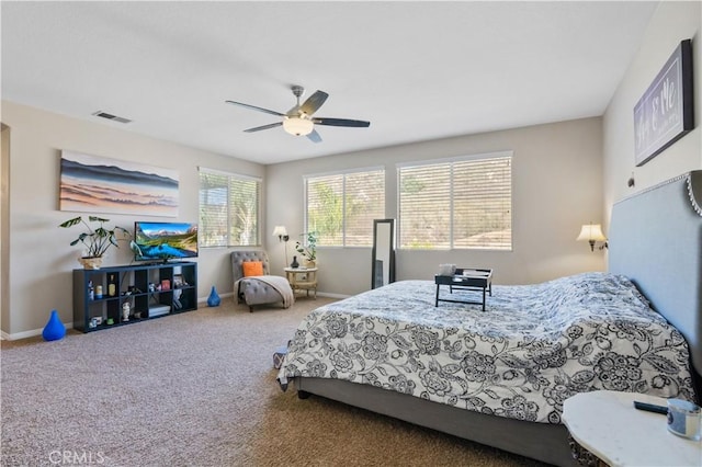 carpeted bedroom featuring ceiling fan