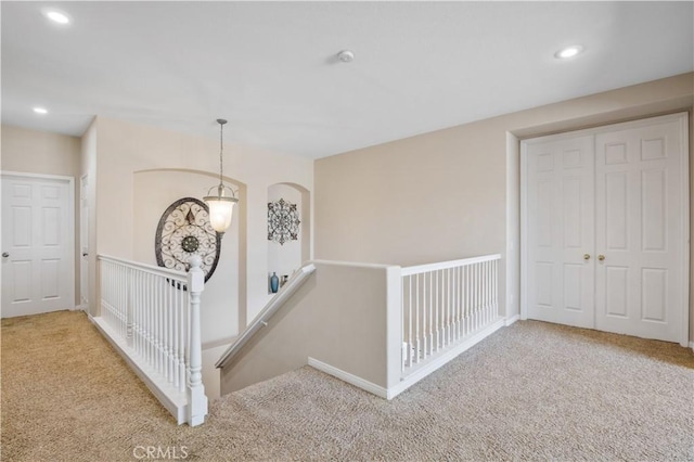 corridor featuring carpet flooring